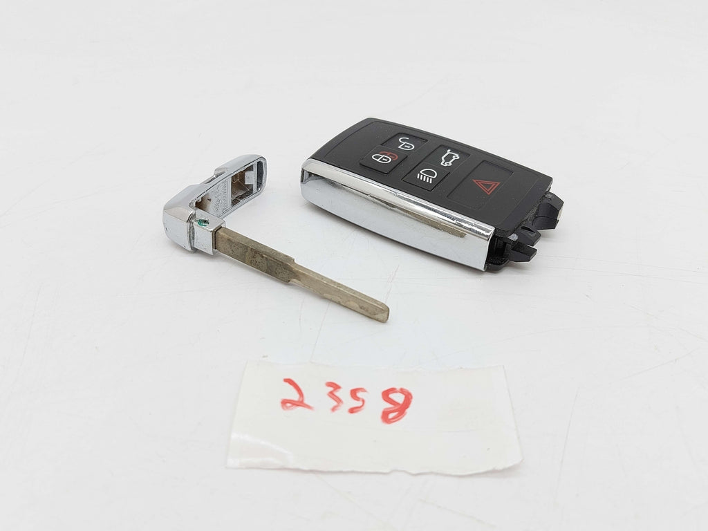 2021 DEFENDER L663 IGNITION SWITCH KEY FOB E100472000 *PITTING*