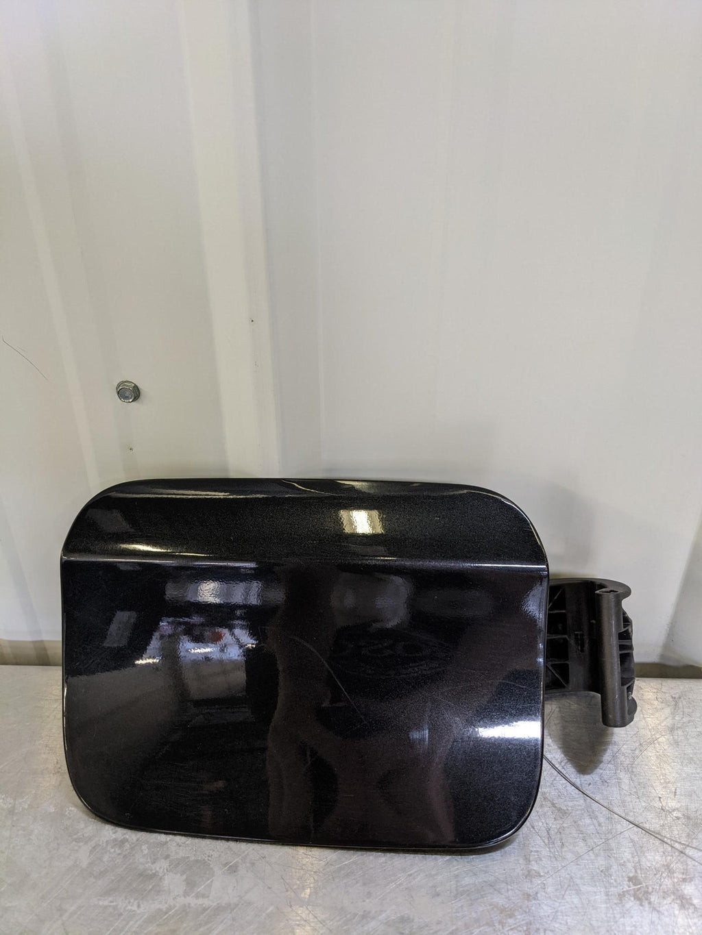 08-14 BMW X6M Fuel Tank Door Black